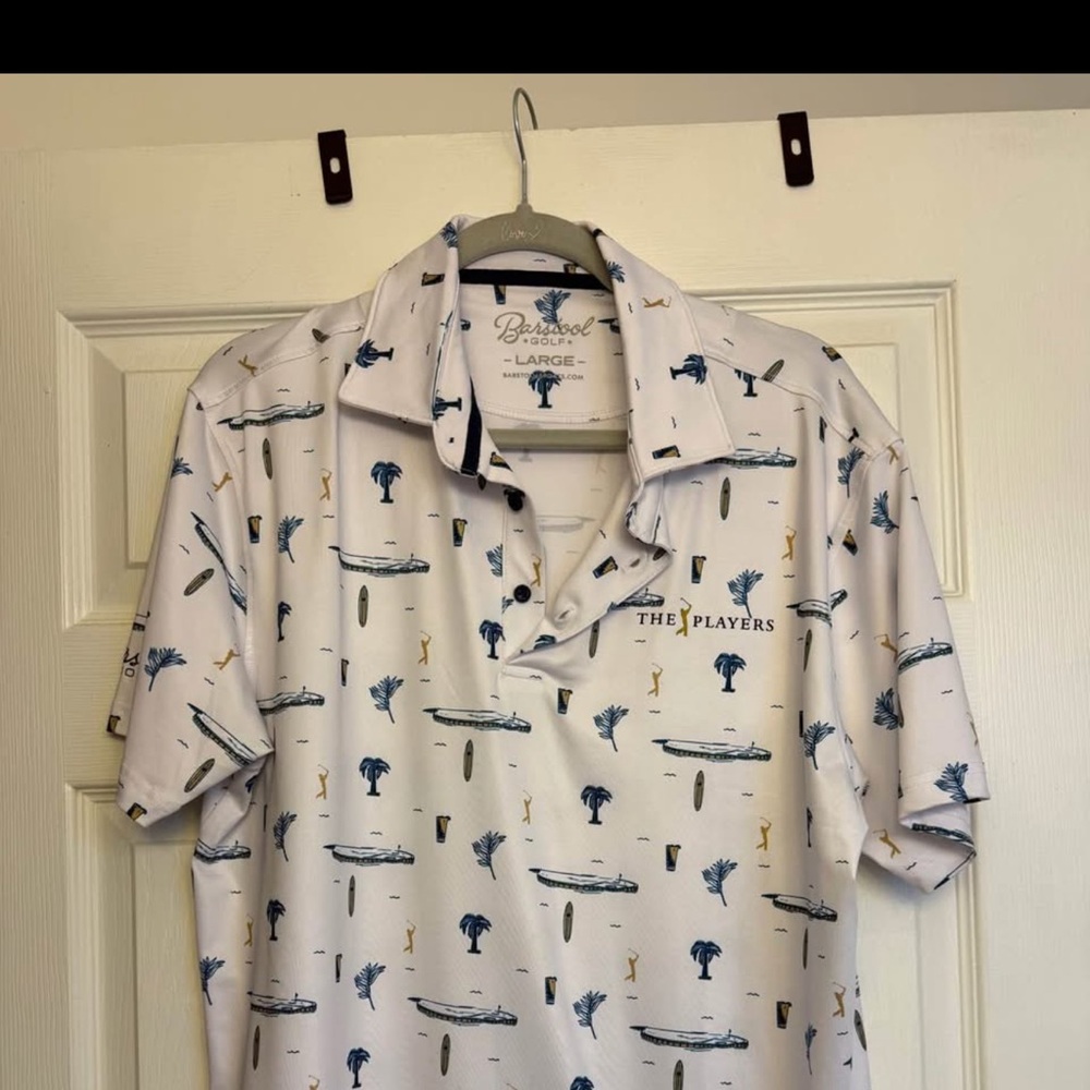 The players golf polo